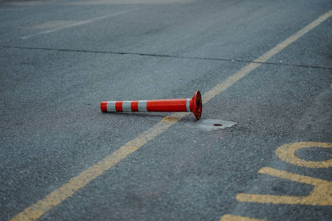 Parking Space With Knocked Over Traffic Cone