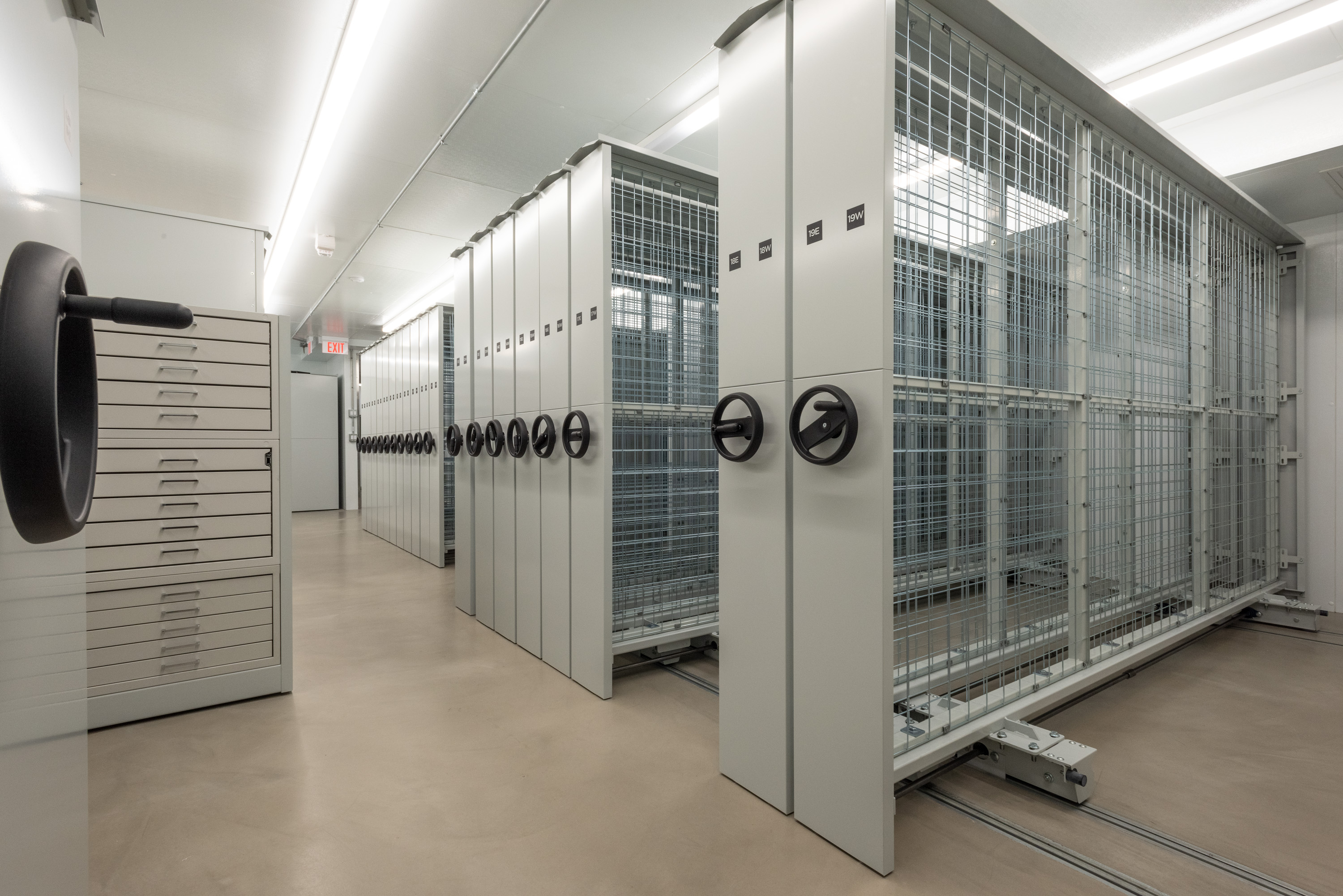Image of a cold storage room with racks and cabinets