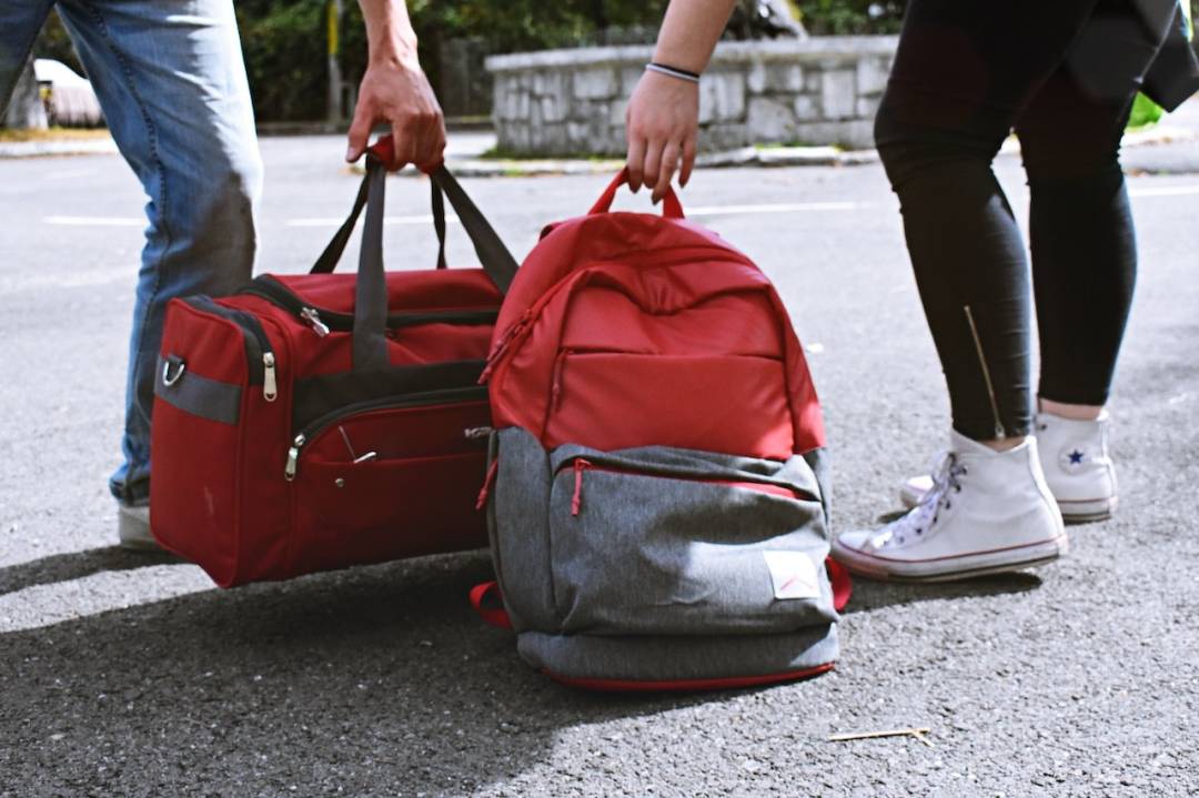 Red Backpack And Red Duffel Bag